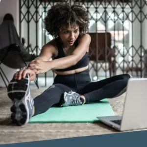 Woman following exercise on a laptop