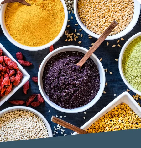 Colorful assortment of herbs, spices, dried vegetables and grains