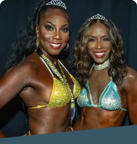 Two glamorous female natural body builders